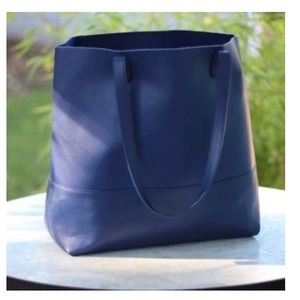 BRAND NEW still in package never been opened tote